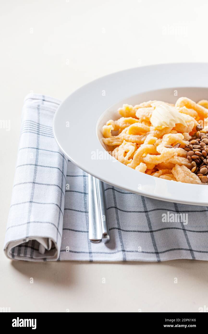homemade 'spaetzle' noodles and lentils Stock Photo