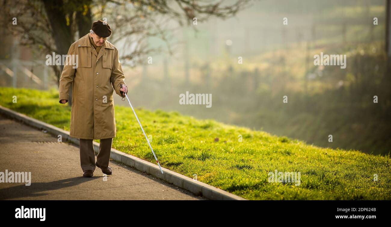 Blind Man Crossing A Street Stock Photo Alamy