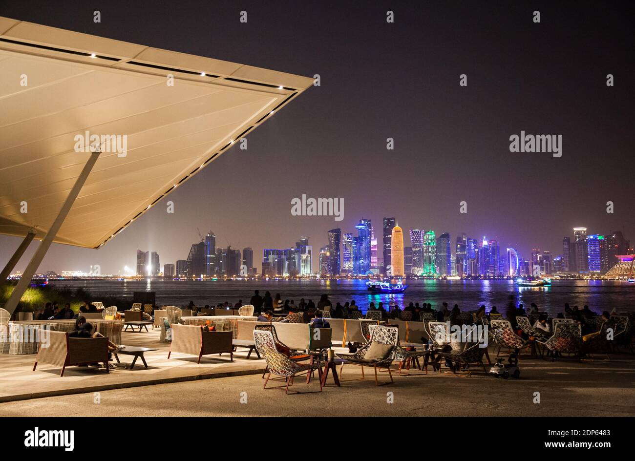 Cafe in front of the skyline of Doha, Qatar Stock Photo