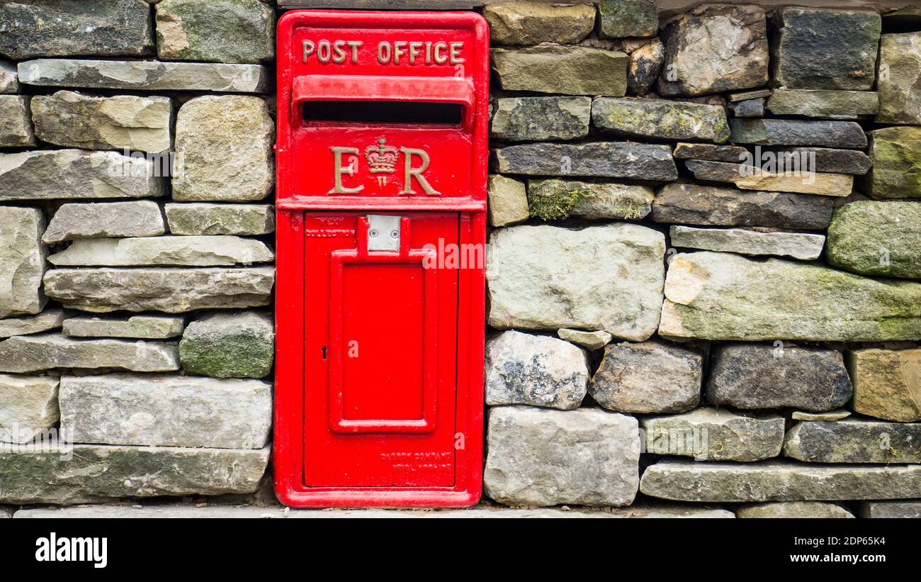 Post box set into dry stone wall Stock Photo - Alamy