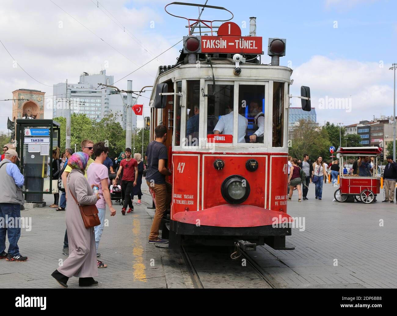 ISTANBUL,TURKEY-JUNE 7:People getting on Tram at  Taksim Square Stop.June 7,2015 in Istanbul,Turkey. Stock Photo