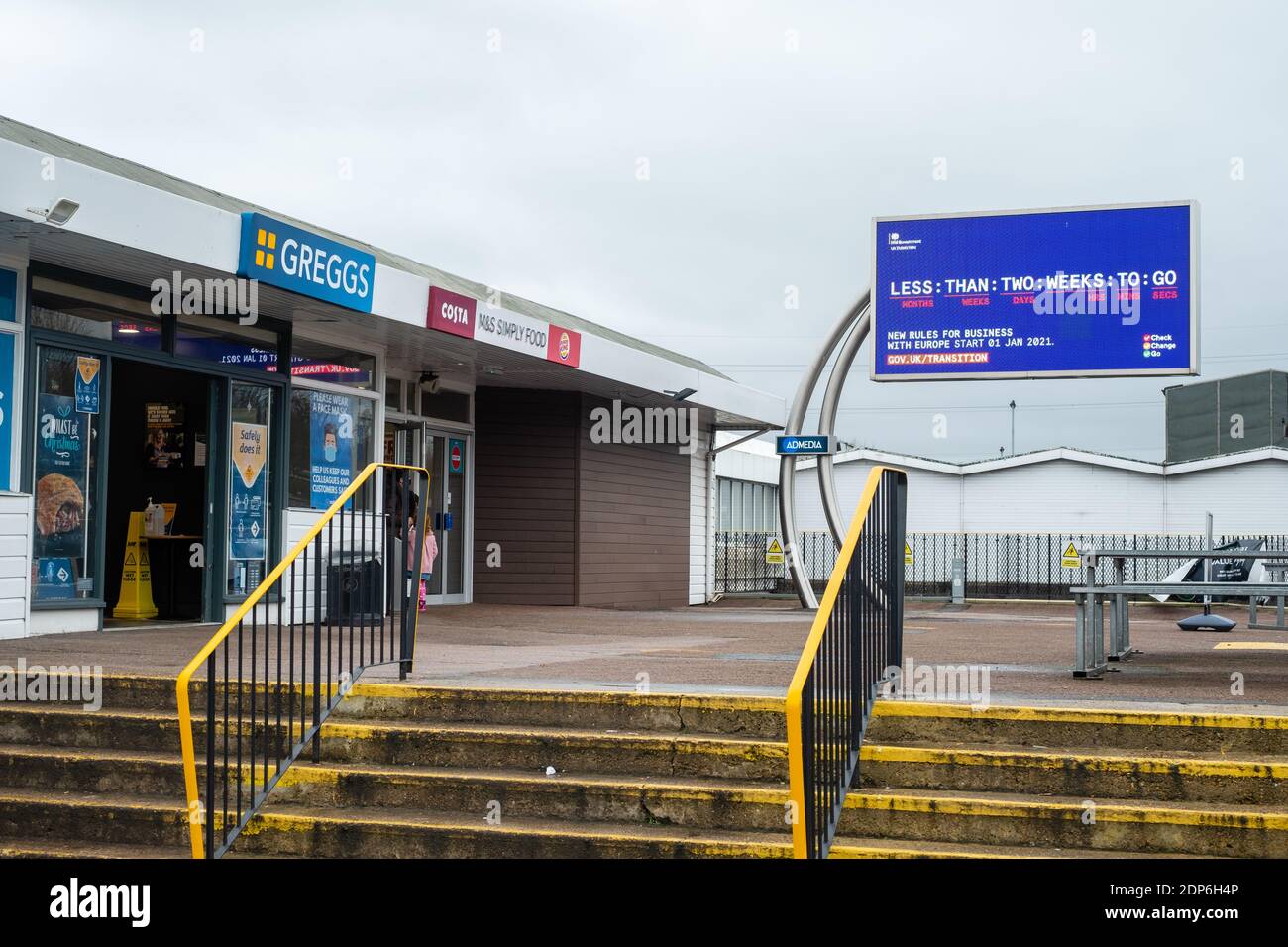 Medway Service Station, Kent, UK. 18th December 2020. A screen displays adverts from the UK government warning road hauliers and drivers on their way to Dover that the Brexit Transition period ends on the 31st December. With less than 2 weeks to go, a deal has still not been finalised between the UK and the EU causing massive uncertainty for business and the public. On the 18th December there was a 6 hour queue for lorries trying to leave ports at Dover. Stock Photo