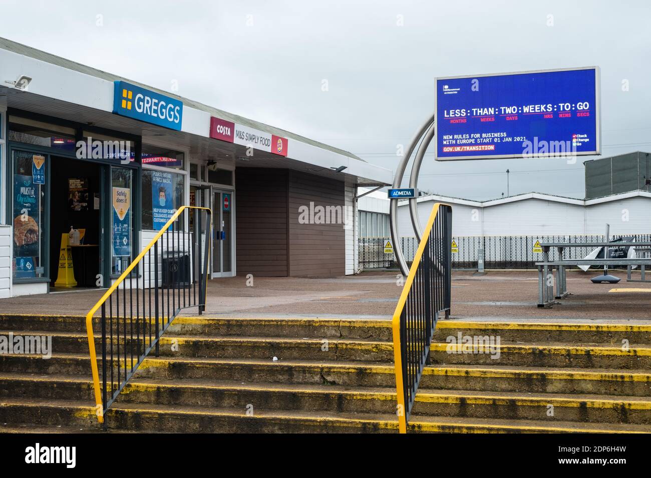 Medway Service Station, Kent, UK. 18th December 2020. A screen displays adverts from the UK government warning road hauliers and drivers on their way to Dover that the Brexit Transition period ends on the 31st December. With less than 2 weeks to go, a deal has still not been finalised between the UK and the EU causing massive uncertainty for business and the public. On the 18th December there was a 6 hour queue for lorries trying to leave ports at Dover. Stock Photo