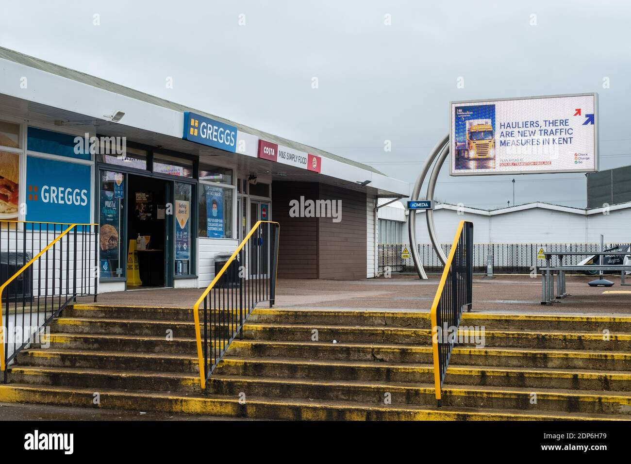 Medway Service Station, Kent, UK. 18th December 2020. A screen displays adverts from the UK government warning road hauliers and drivers on their way to Dover that the Brexit Transition period ends on the 31st December. With less than 2 weeks to go, a deal has still not been finalised between the UK and the EU causing massive uncertainty for business and the public. On the 18th December there was a 6 hour queue for lorries trying to leave ports at Dover. Stock Photo