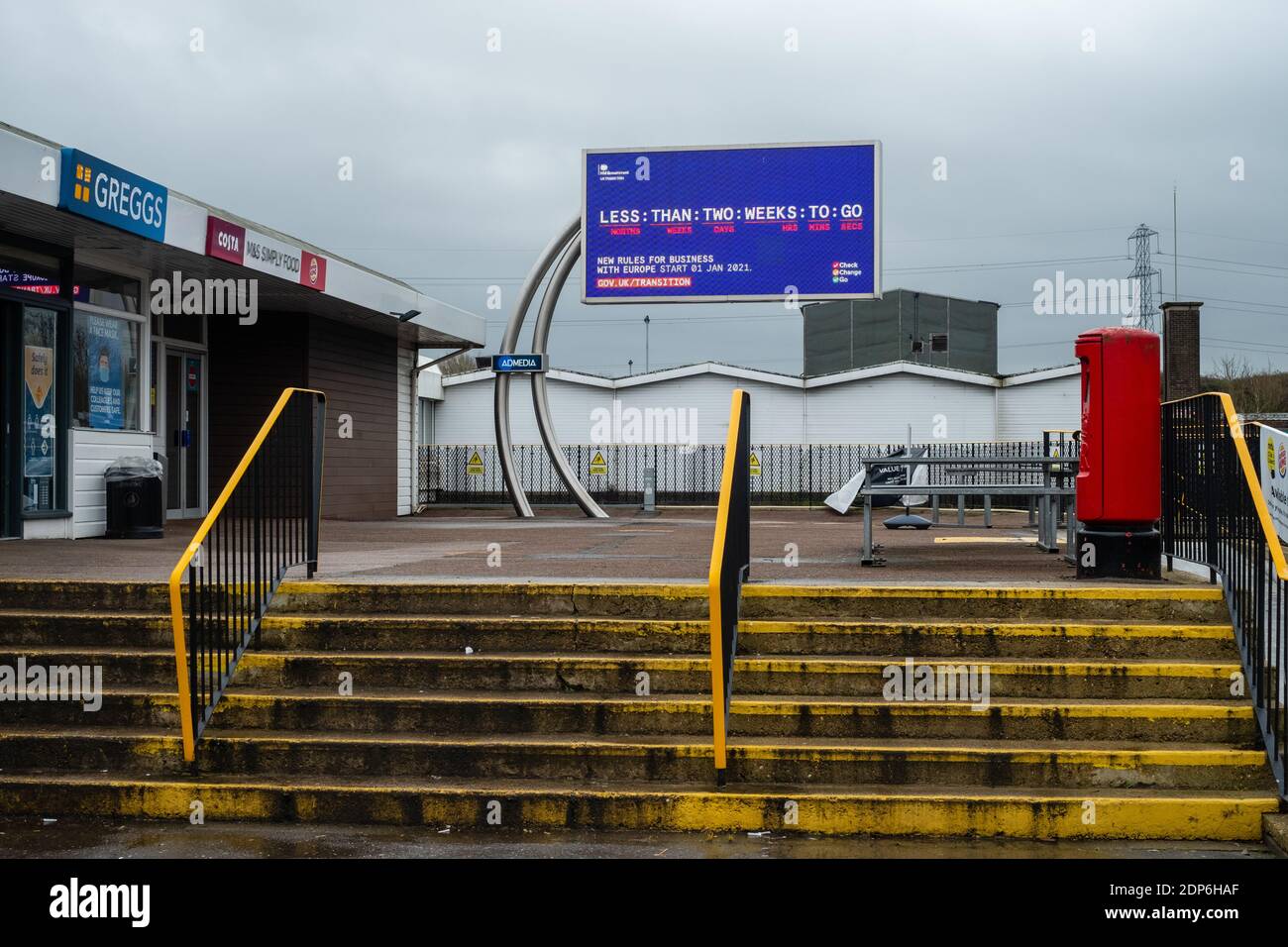 Medway Service Station, Kent, UK. 18th December 2020. A screen displays adverts from the UK government warning road hauliers and drivers on their way to Dover that the Brexit Transition period ends on the 31st December. With less than 2 weeks to go, a deal has still not been finalised between the UK and the EU causing massive uncertainty for business and the public. On the 18th December there was a 6 hour queue for lorries trying to leave ports at Dover. Stock Photo