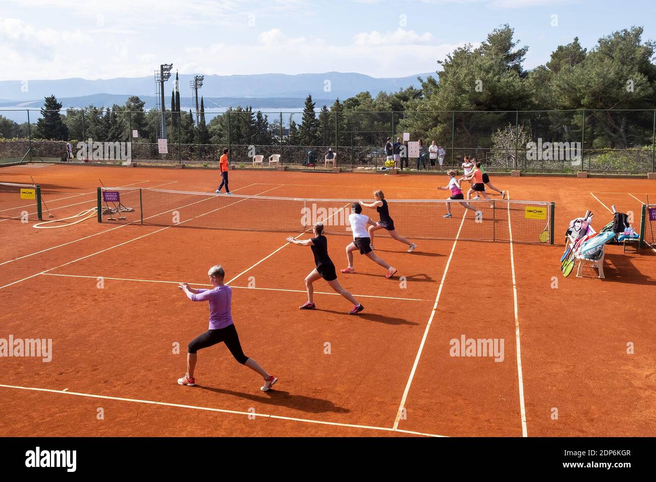 Bol, DalGroup of women doing warm up exercises in a tennis camp in Bol,Brac  Island, Dalmatia, Croatia, Europe Stock Photo - Alamy