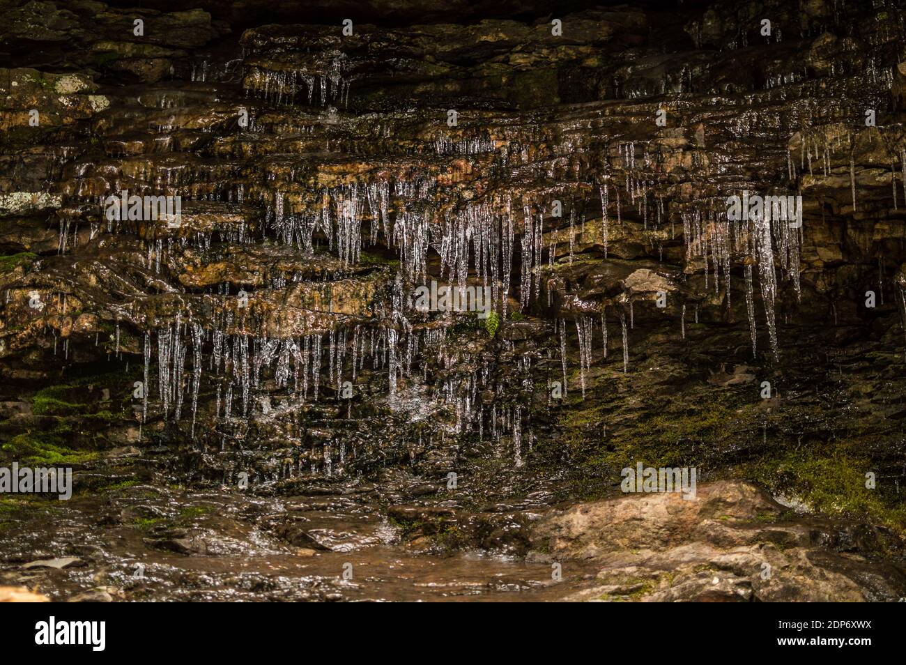 Ice cascades down a terrace of exsposed rock strata Stock Photo