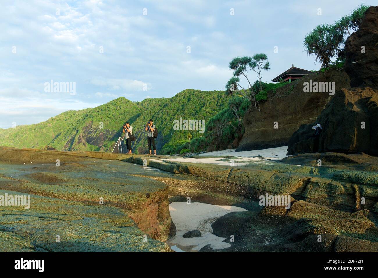 The tourists on Papuma beach, Jember. Stock Photo