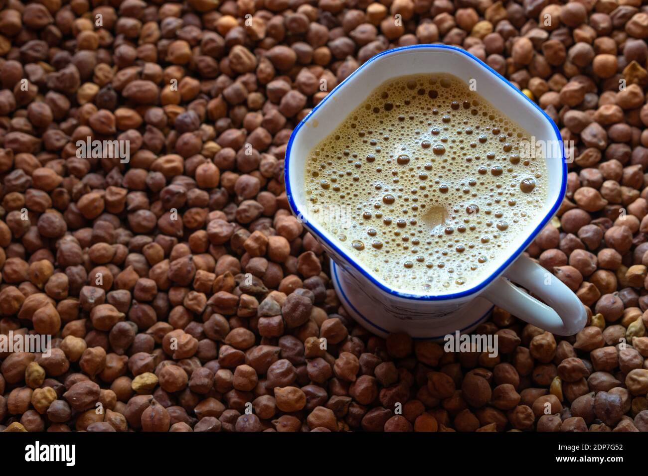 Fresh coffee in a white cup on a gram background Stock Photo