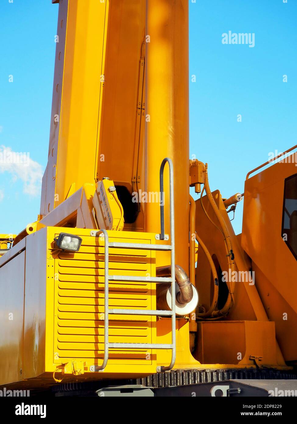 Detail of a yellow heavy-lift crane with cabin Stock Photo