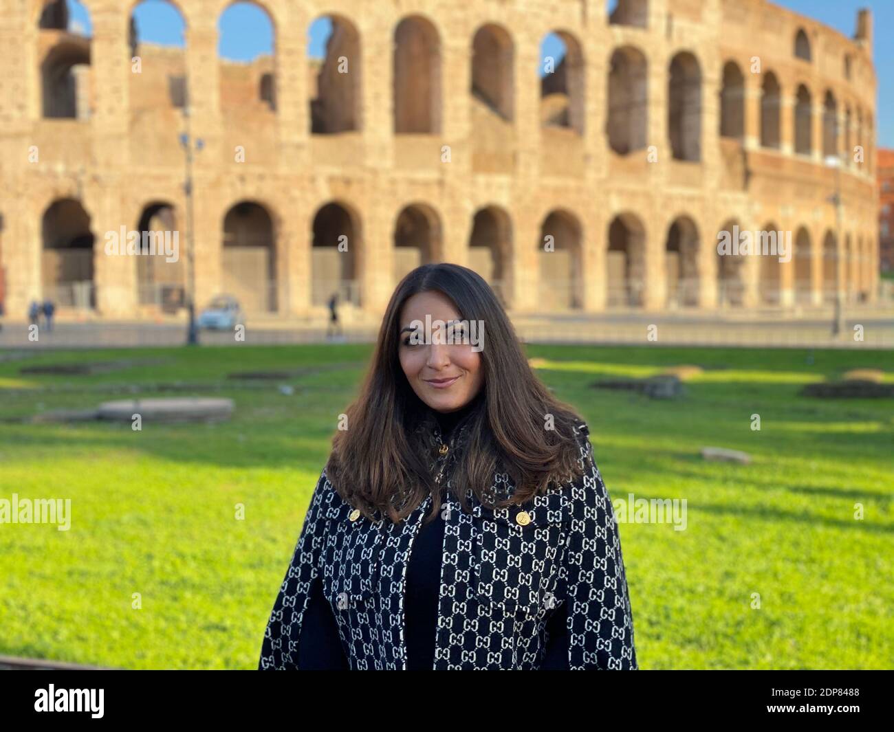 Rome, Italy. 16th Dec, 2020. Veteran tour guide Elisa Valeria Bove poses for a photo at the Colosseum in Rome, Italy, Dec. 16, 2020. TO GO WITH 'Feature: Veteran tour guide bets big on recovery of Italy's tourism sector despite coronavirus impact' Credit: Franco Bizzantino/Xinhua/Alamy Live News Stock Photo