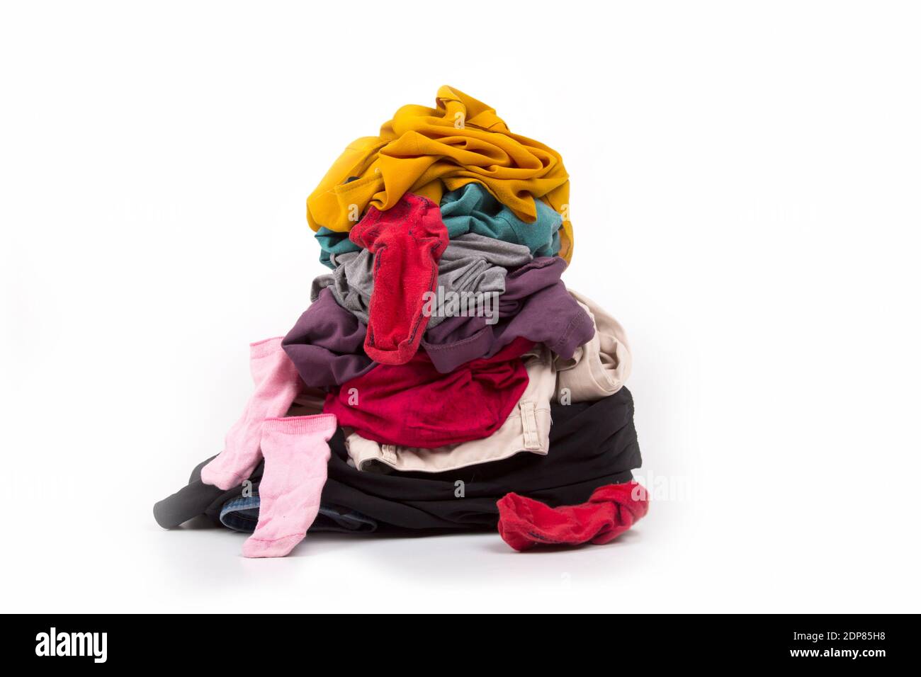 dirty laundry waiting to be washed, on a white background Stock Photo