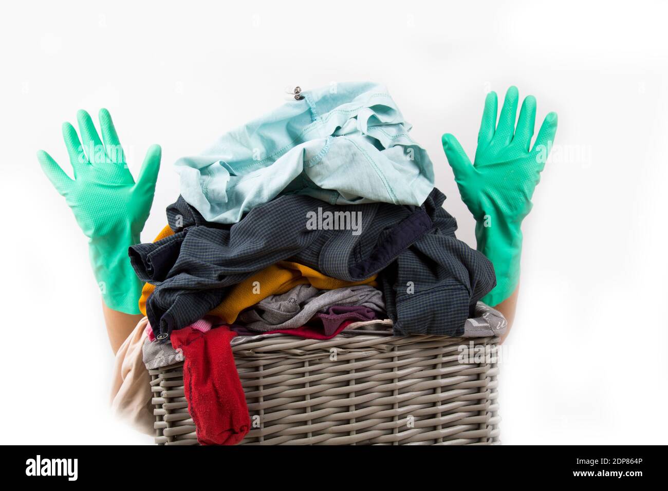dirty laundry waiting to be washed in the laundry basket Stock Photo