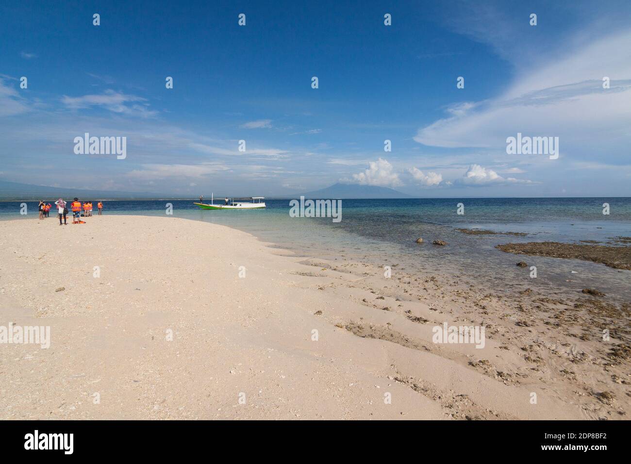 The tourists arrive at Tabuhan Island, one of the marine tourism destinations in Banyuwangi district. Stock Photo