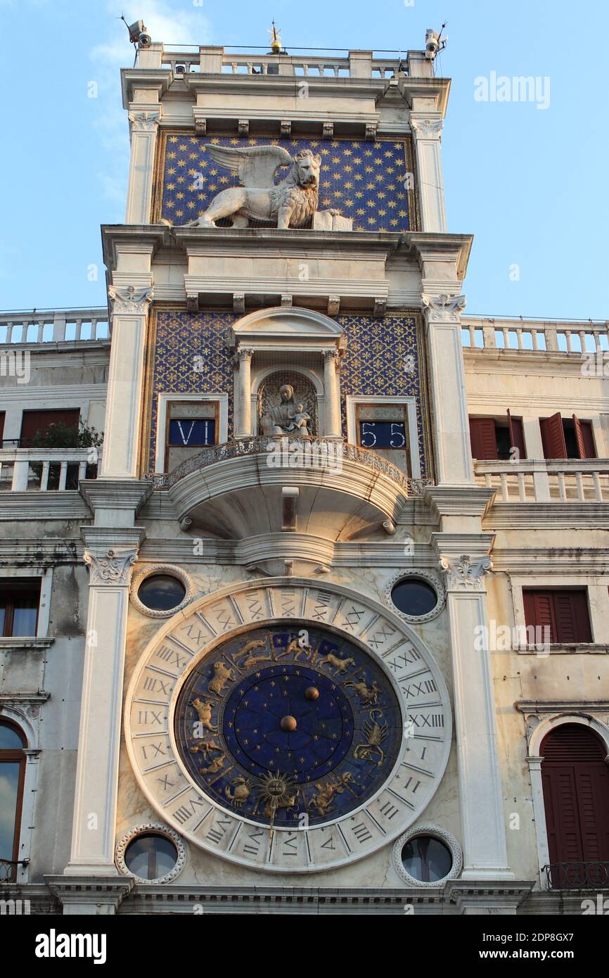 A vertical shot of St. Mark's Clock tower in Venice Stock Photo - Alamy