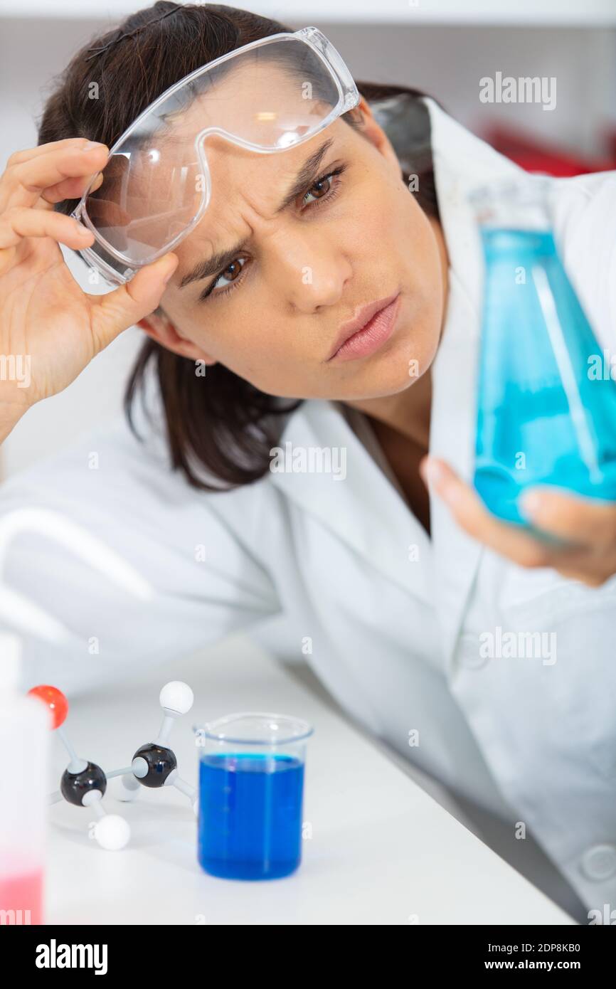 Asian scientist dropping test tube hi-res stock photography and images ...