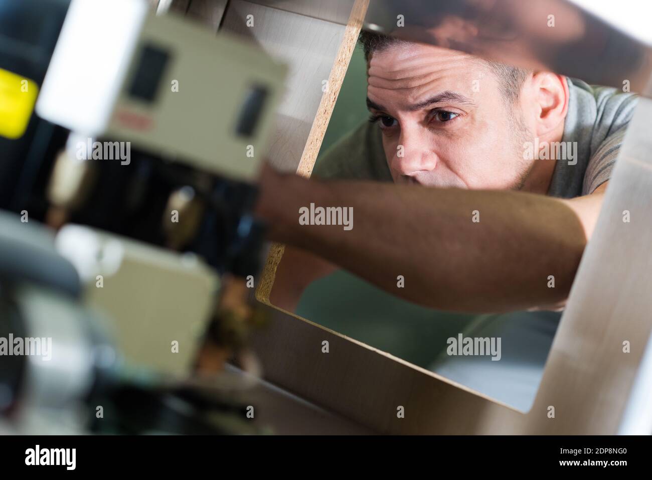 man placing boxes on conveyor belt Stock Photo - Alamy