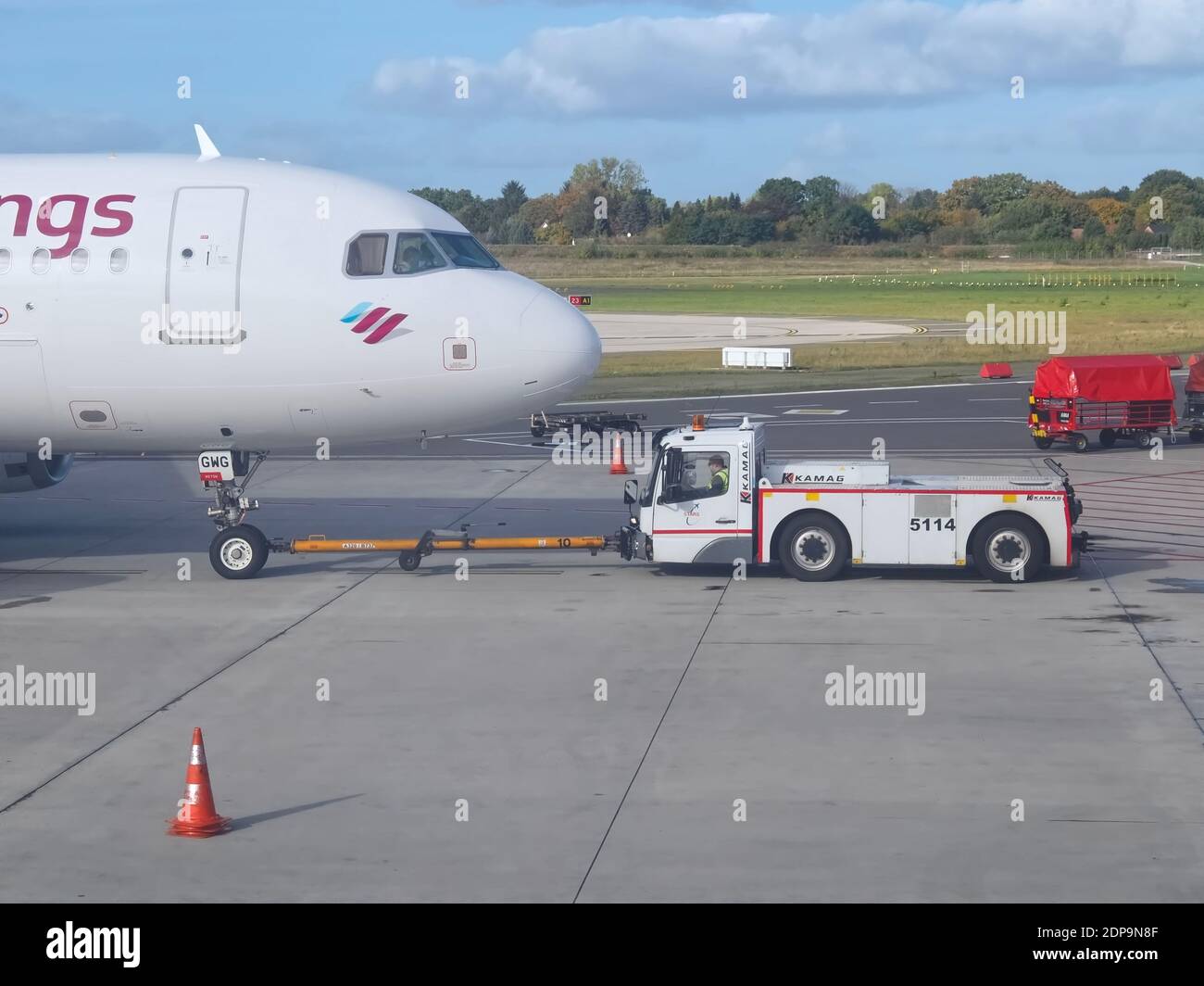 Eurowings airplane at Faro airport is towed onto the tarmac Stock Photo