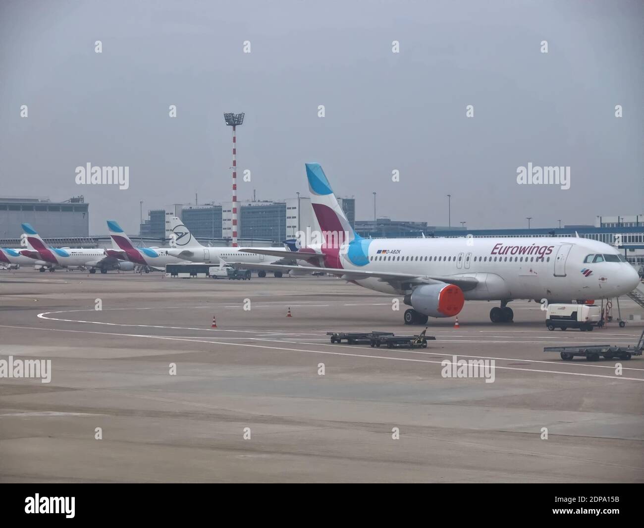 Row of Eurowings airplanes at Duesseldorf airport in park position during Covid-19 pandemic Stock Photo