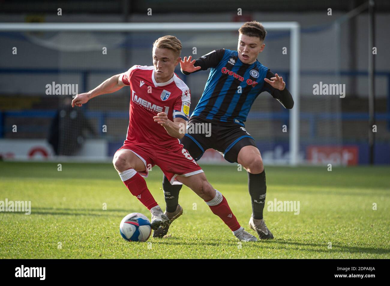 ROCHDALE, ENGLAND. DECEMBER 19TH Kyle Dempsey of Gillingham FC under pressure from Paul McShane of Rochdale AFC during the Sky Bet League 1 match between Rochdale and Gillingham at Spotland Stadium, Rochdale on Saturday 19th December 2020. (Credit: Ian Charles | MI News) Credit: MI News & Sport /Alamy Live News Stock Photo