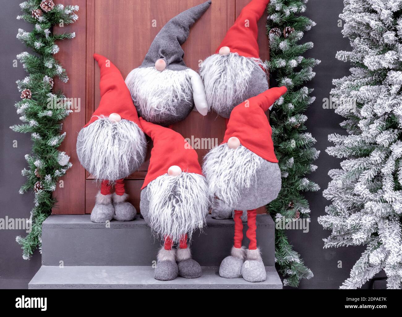 New Year's Scandinavian gnomes on the porch of a decorated house Stock  Photo - Alamy