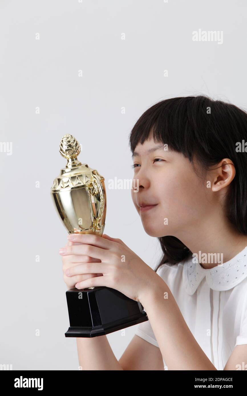Teenage trophy hi-res stock photography and images - Alamy