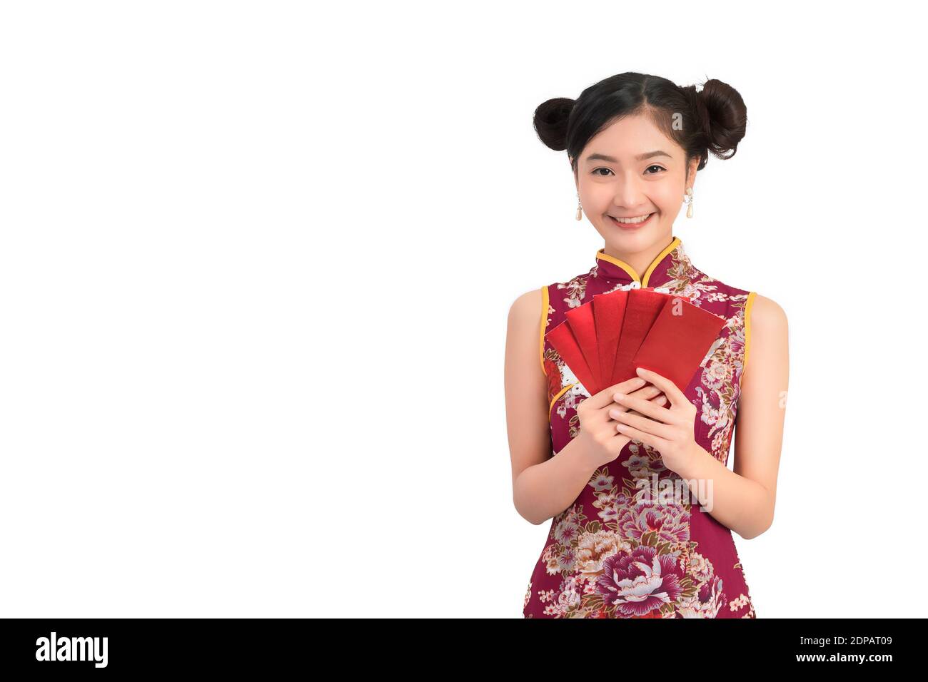 Portrait Of Beautiful Woman Wearing Chinese Dress Holding Envelopes Against White Background Stock Photo