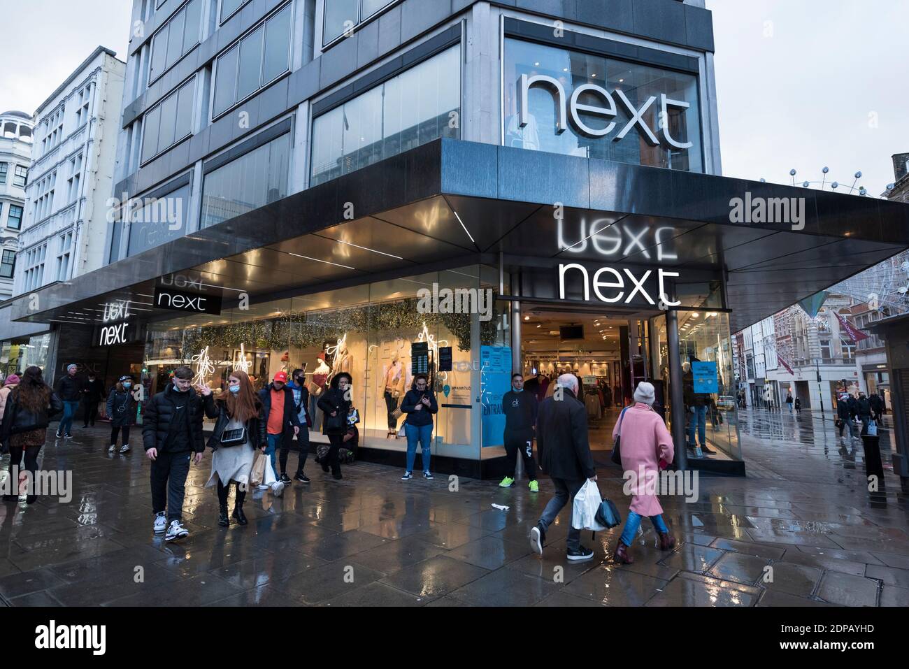 London, UK. 19 December 2020. The exterior of a Next store on Oxford  Street. It is reported that Next and Davidson Kempner Capital Management, a  US based firm, have held talks to