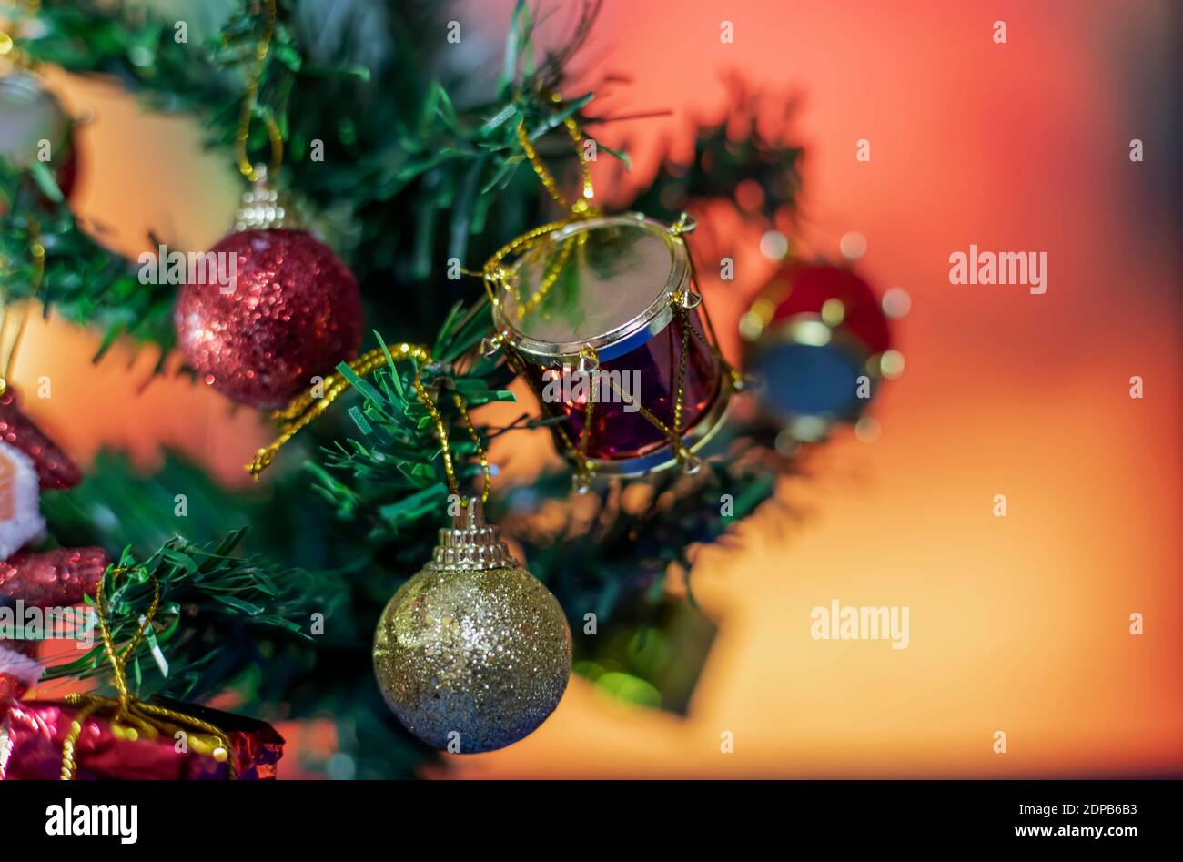 Decorated Christmas tree on blurred backgrounds Stock Photo