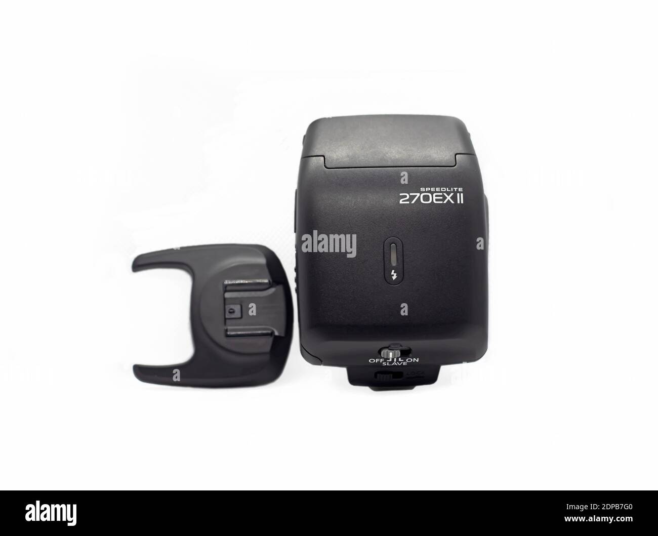 Professional photo camera flash light isolated on white background. Stock Photo