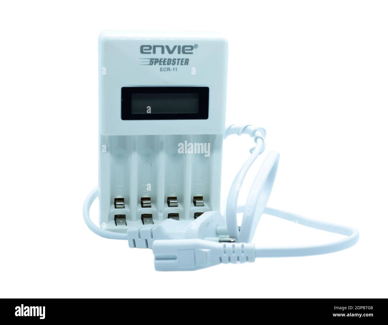 White charger for AA and AAA batteries with unplugged cables Stock