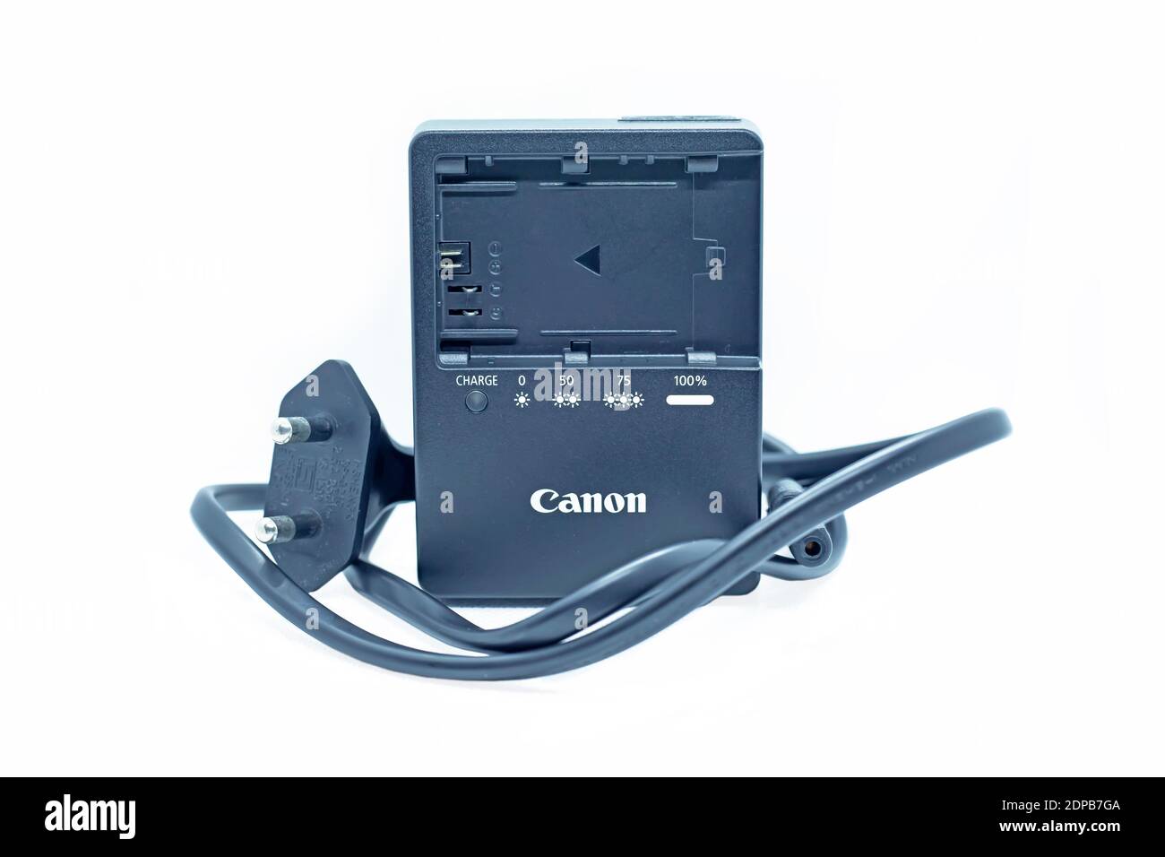 Canon EOS 5D mark iv battery charger with charger cable isolated on