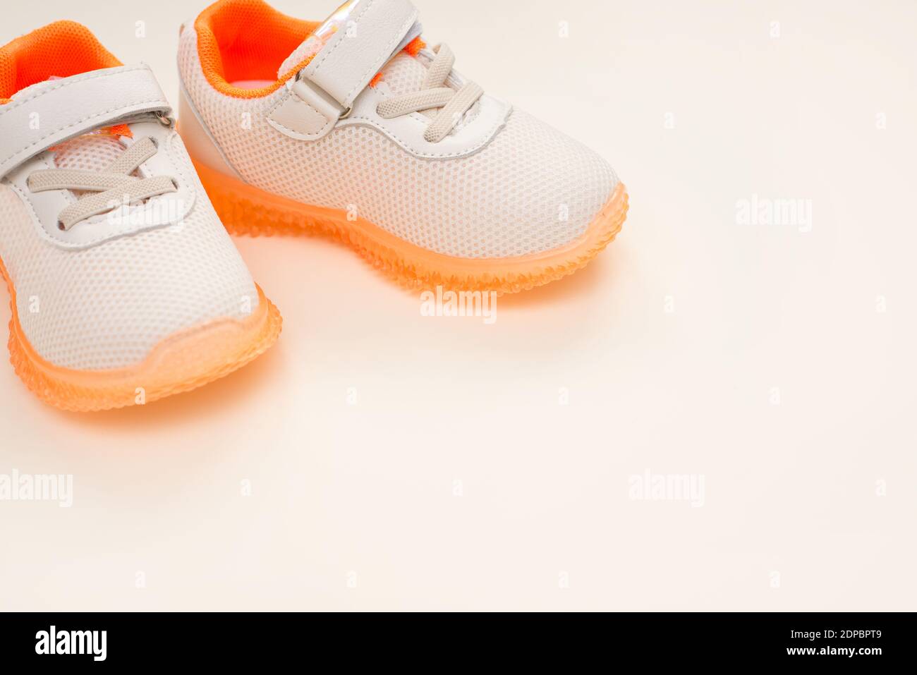 Children's running shoes on light background , copy space Stock Photo ...