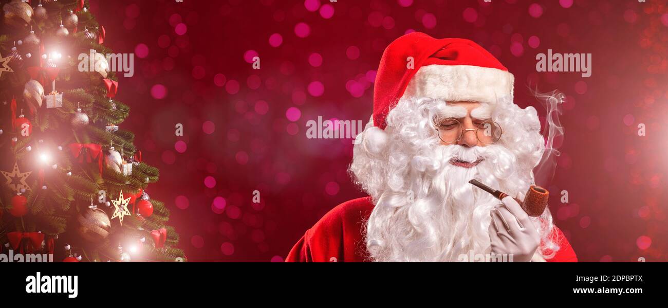 Santa Claus With Pipe High Resolution Stock Photography and Images - Alamy