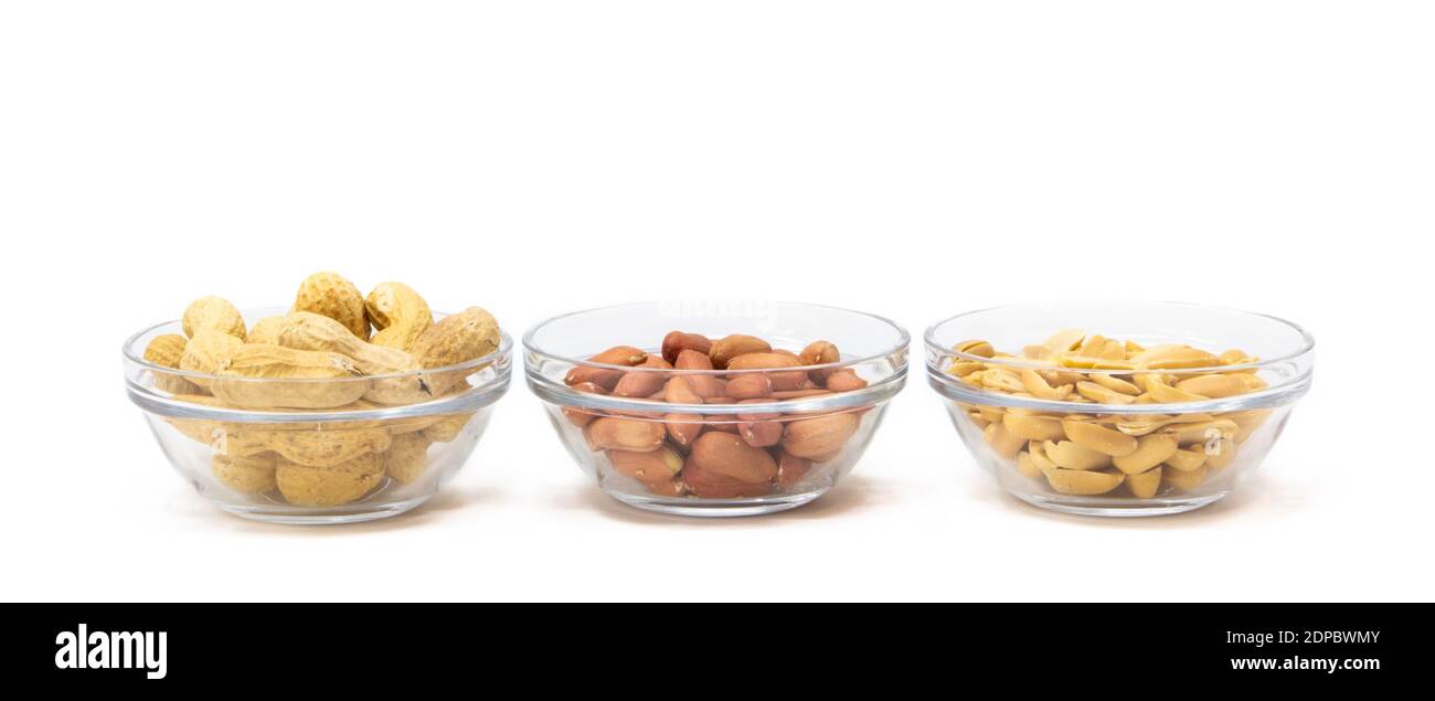 Peanut In Shell, Skin And Without Inside A Glass Bowl On A White