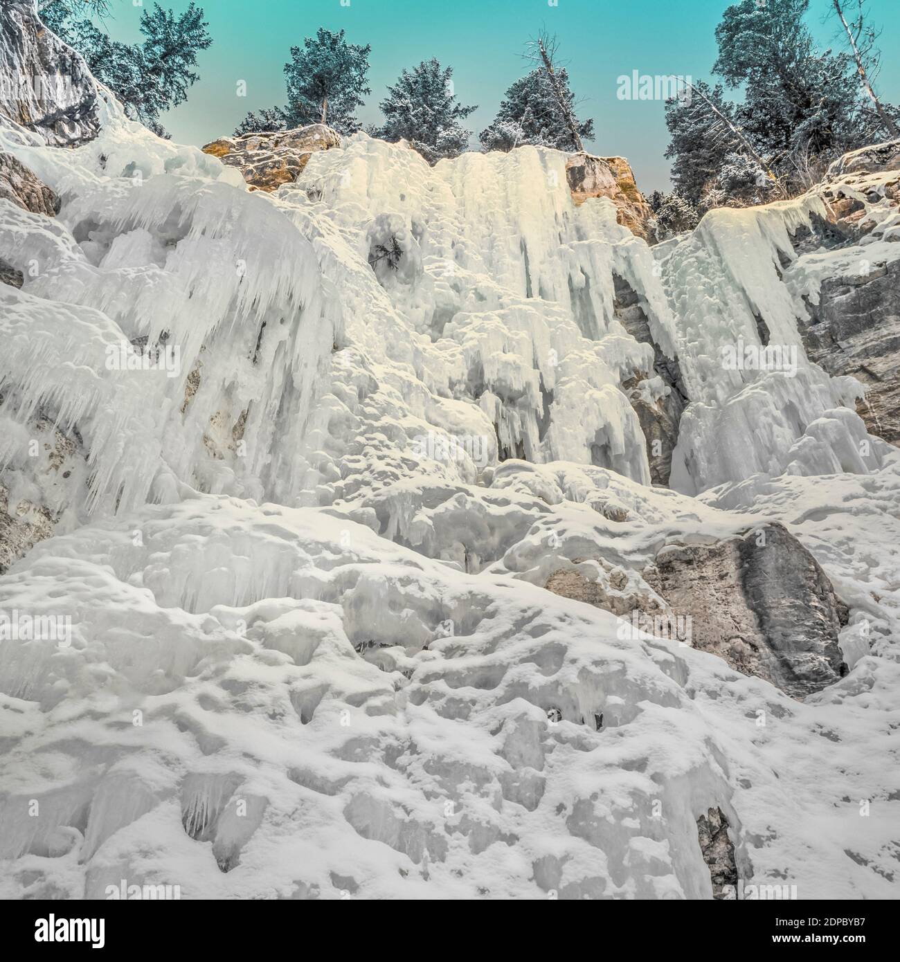 frozen cataract falls in the elk creek basin along the rocky mountain front near augusta, montana Stock Photo