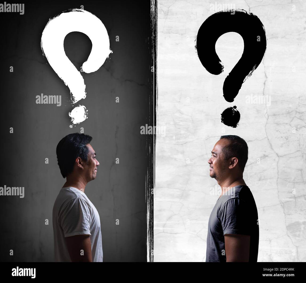 Asian man with question mark on a balck and white background Stock Photo