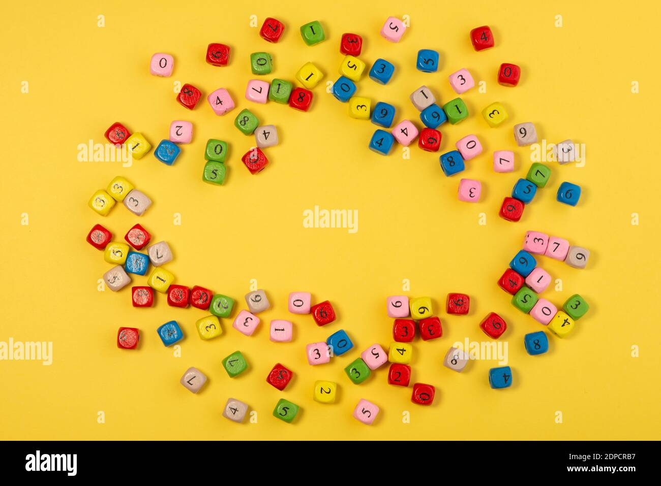 Colourful number frame with bright yellow background. Copy space for ...