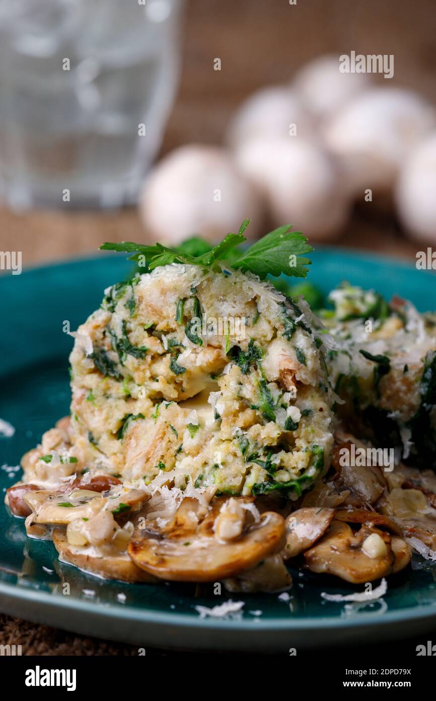 filled dumplings with mushroom sauce Stock Photo