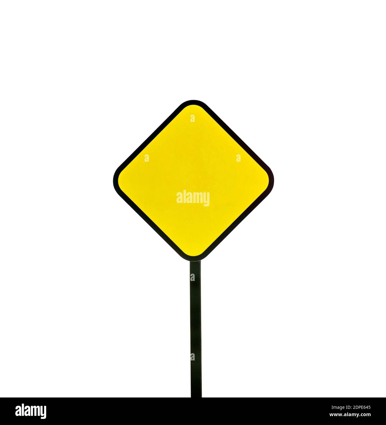 Close-up Of Yellow Blank Signboard Against White Background Stock Photo