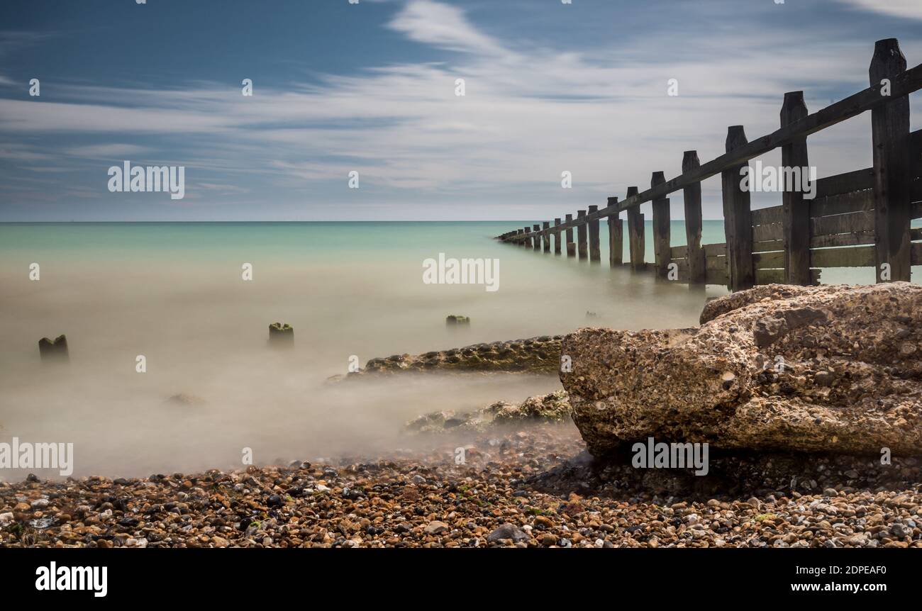 Sea defence (Gyones) on the pebbled beach at Climping Stock Photo