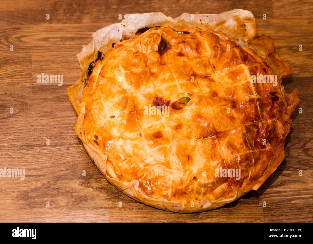 Baked potato pie on a woden table Stock Photo