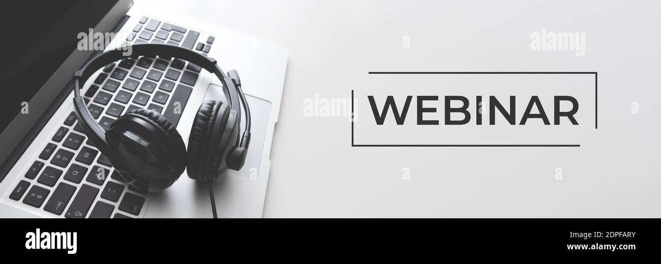 Webinar online, internet education, e-learning concept. Headset and laptop in the call center Stock Photo