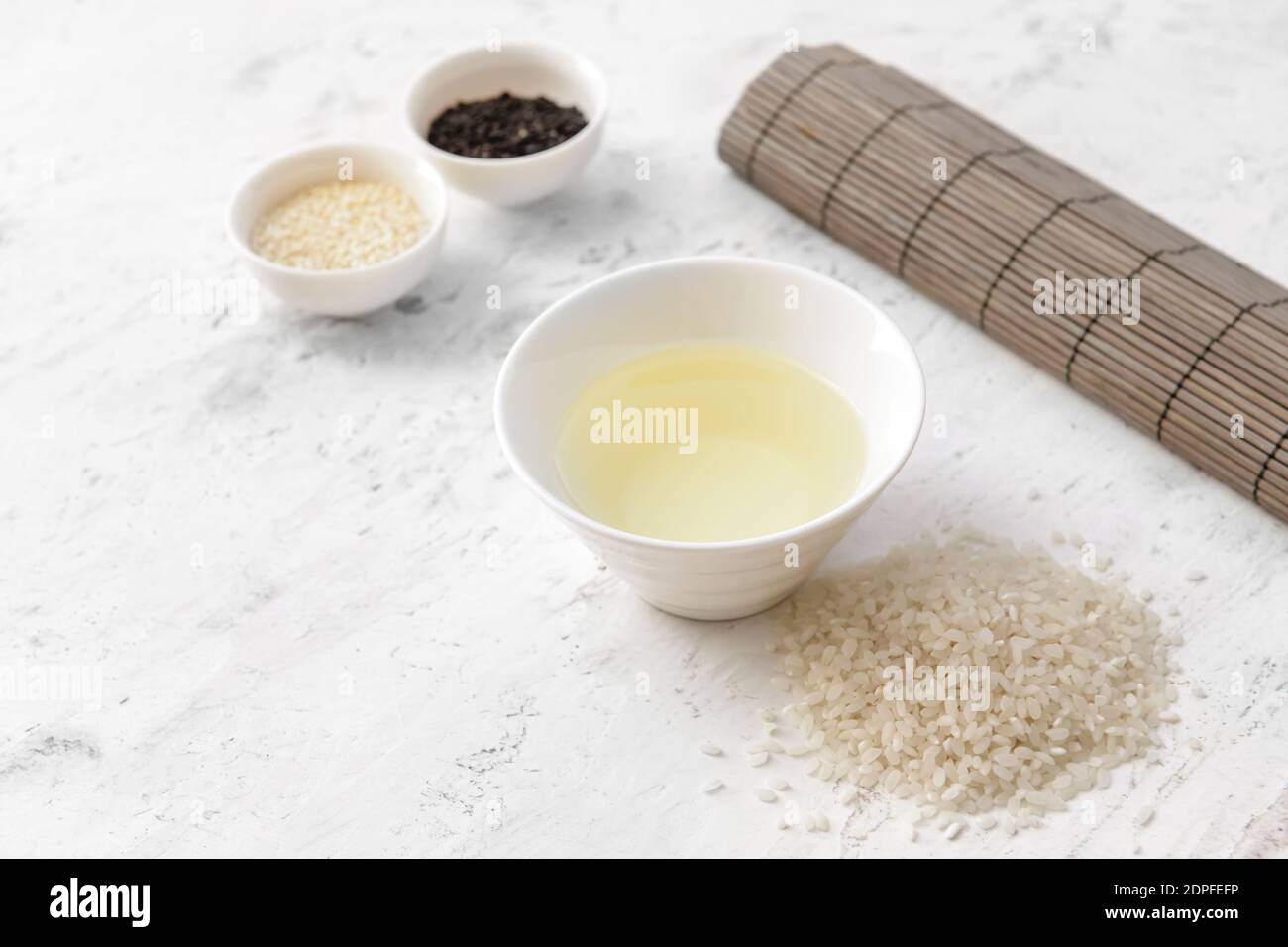 Composition with rice vinegar on table Stock Photo