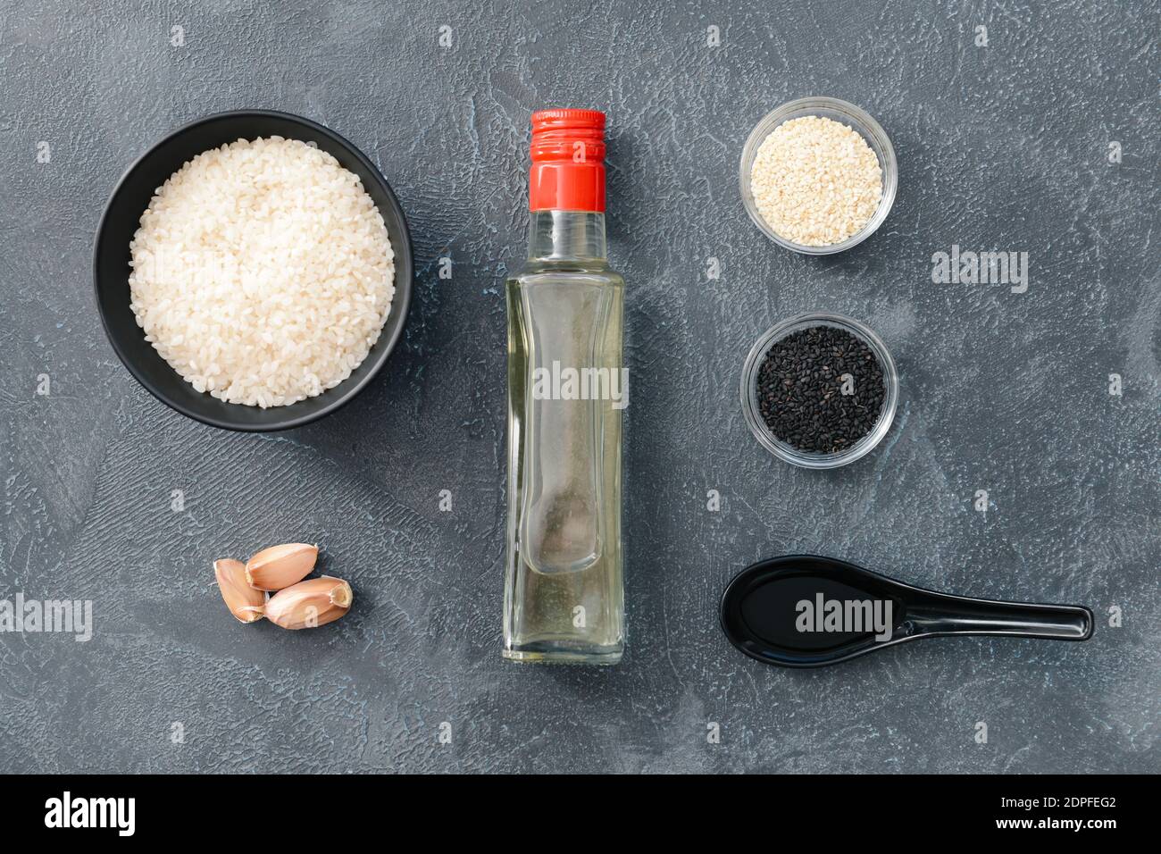 Composition with rice vinegar on dark background Stock Photo