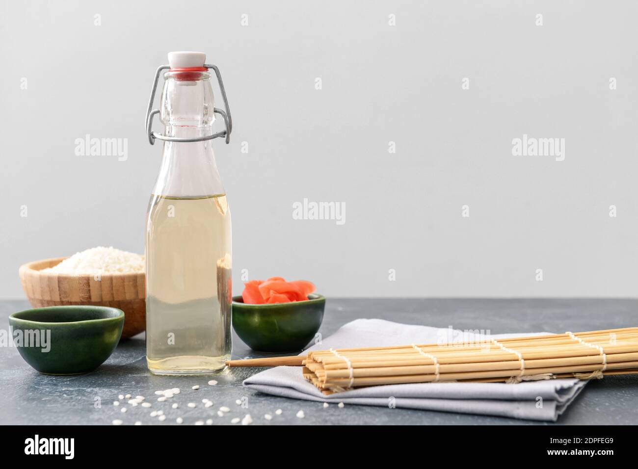 Composition with rice vinegar on table Stock Photo Alamy