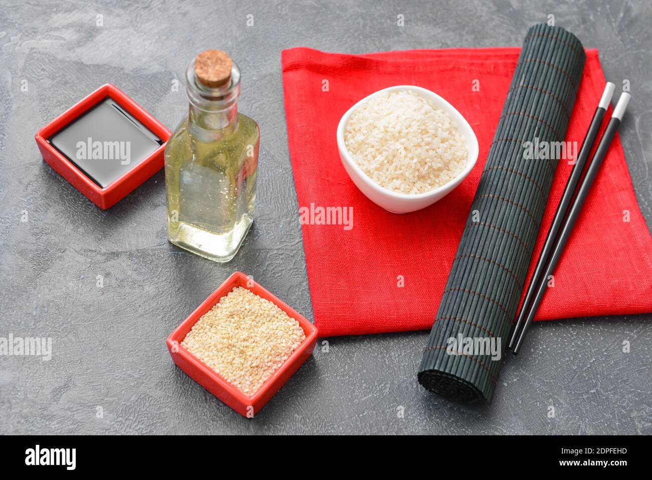 Composition with rice vinegar on dark background Stock Photo