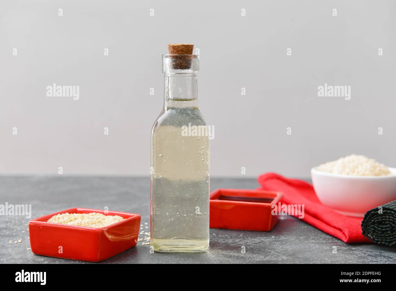 Composition with rice vinegar on table Stock Photo