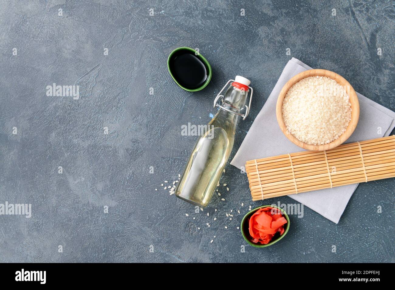 Composition with rice vinegar on dark background Stock Photo