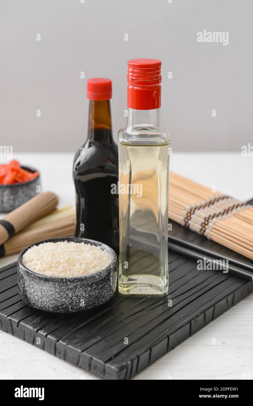 Composition with rice vinegar on table Stock Photo
